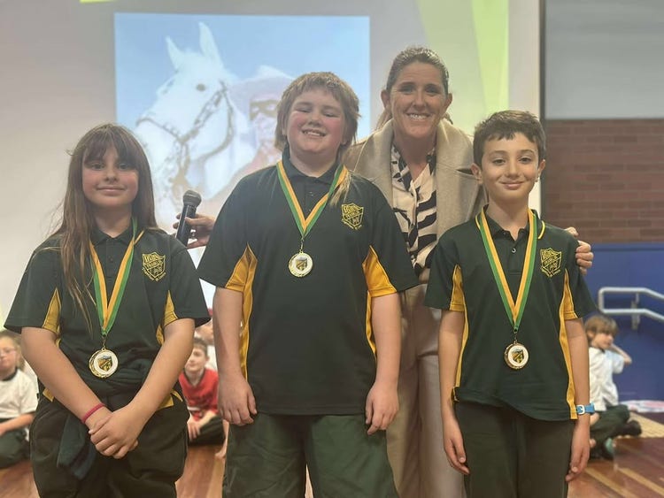 Spelling Bee winners Dom Duncan, Evelyn Chacos, and runner-up Darcy Paul